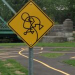 Picture of a complicated road sign with lots of squiggles.
